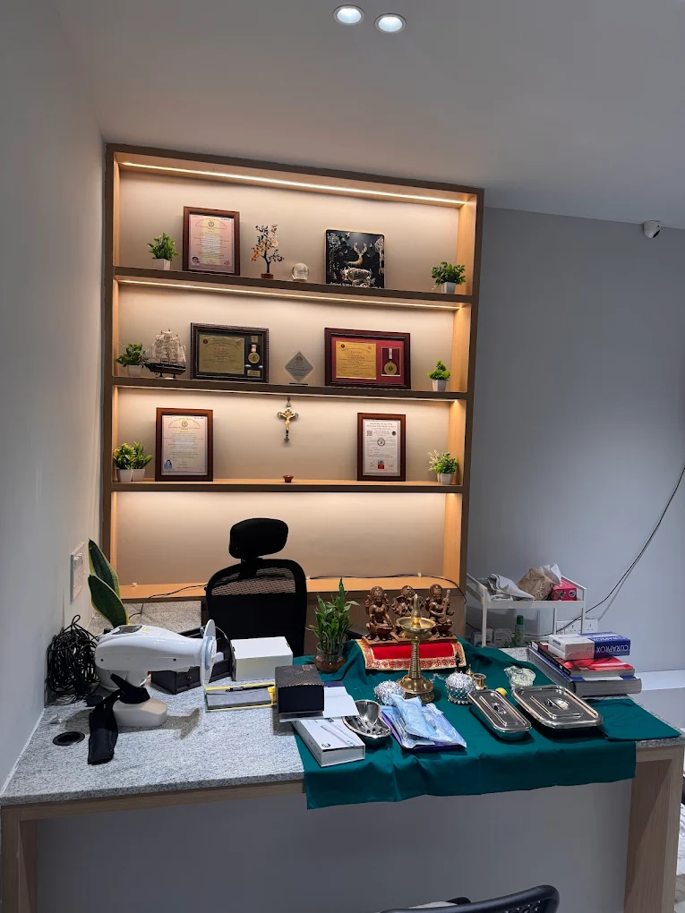 Interior view of Tooth & Root Dental Clinic showing certificates and modern setup